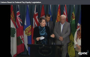 Debi Daviau and other union leaders at a news conference on Parliament Hill 