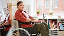 Woman sitting in wheelchair